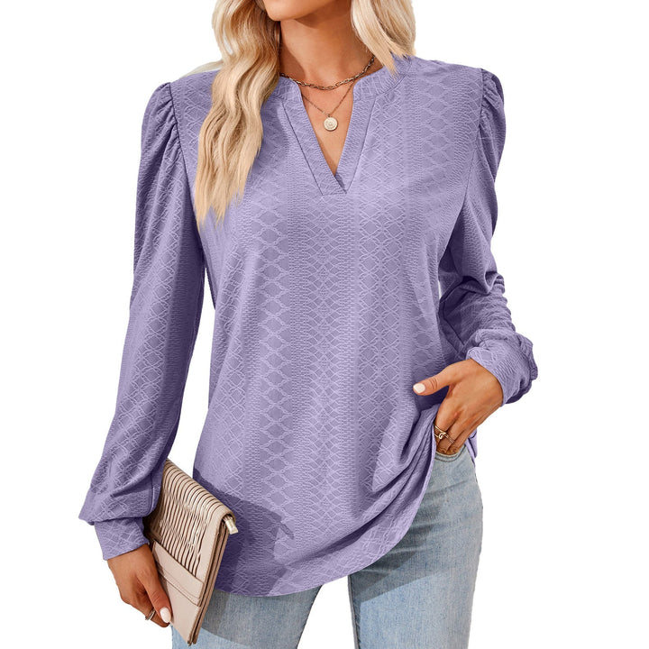 Eldra – Blus med struktur och V-hals